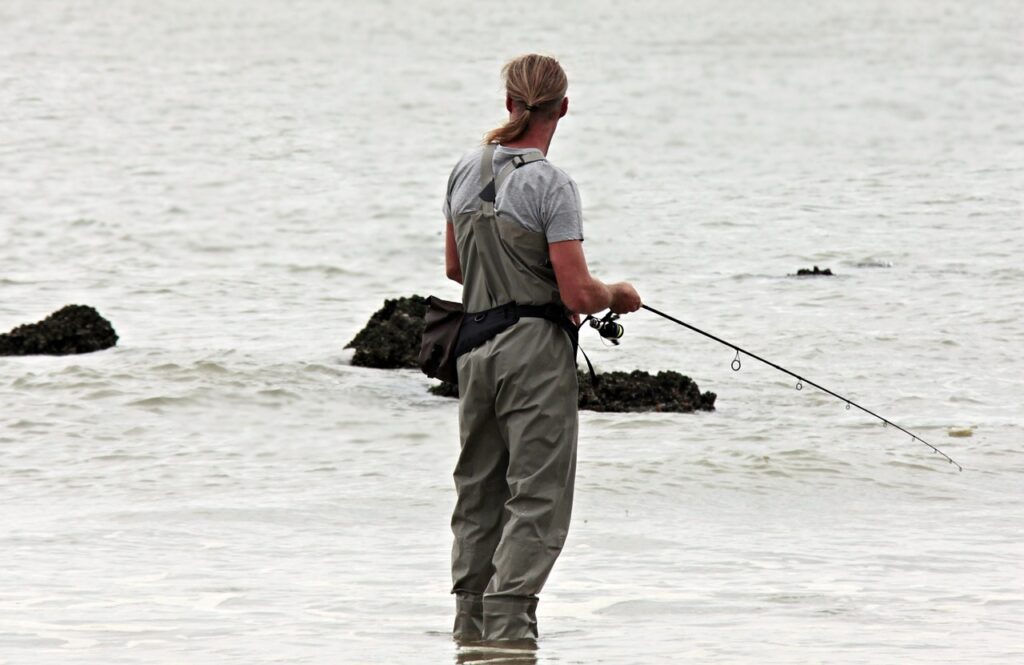 angler catching fish to relieve stress